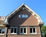 Zijkant van één van de huizen aan de Mozartkade.
<br/>
Gert-Jan Lobbes, 2015